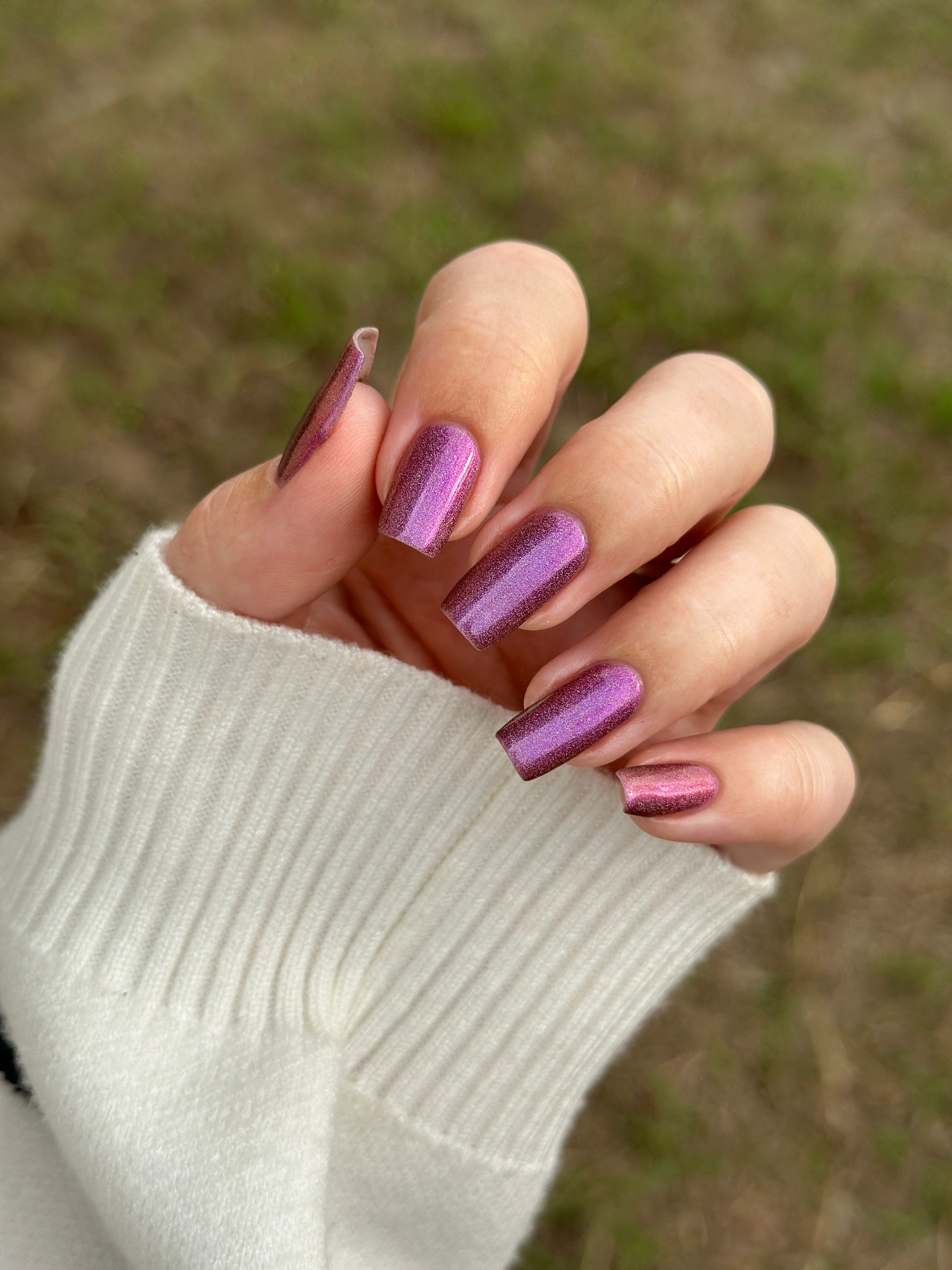 Keys to the Kingdom by Glitch Lacquer, berry multichrome holo swatch on light-medium skin, coffin