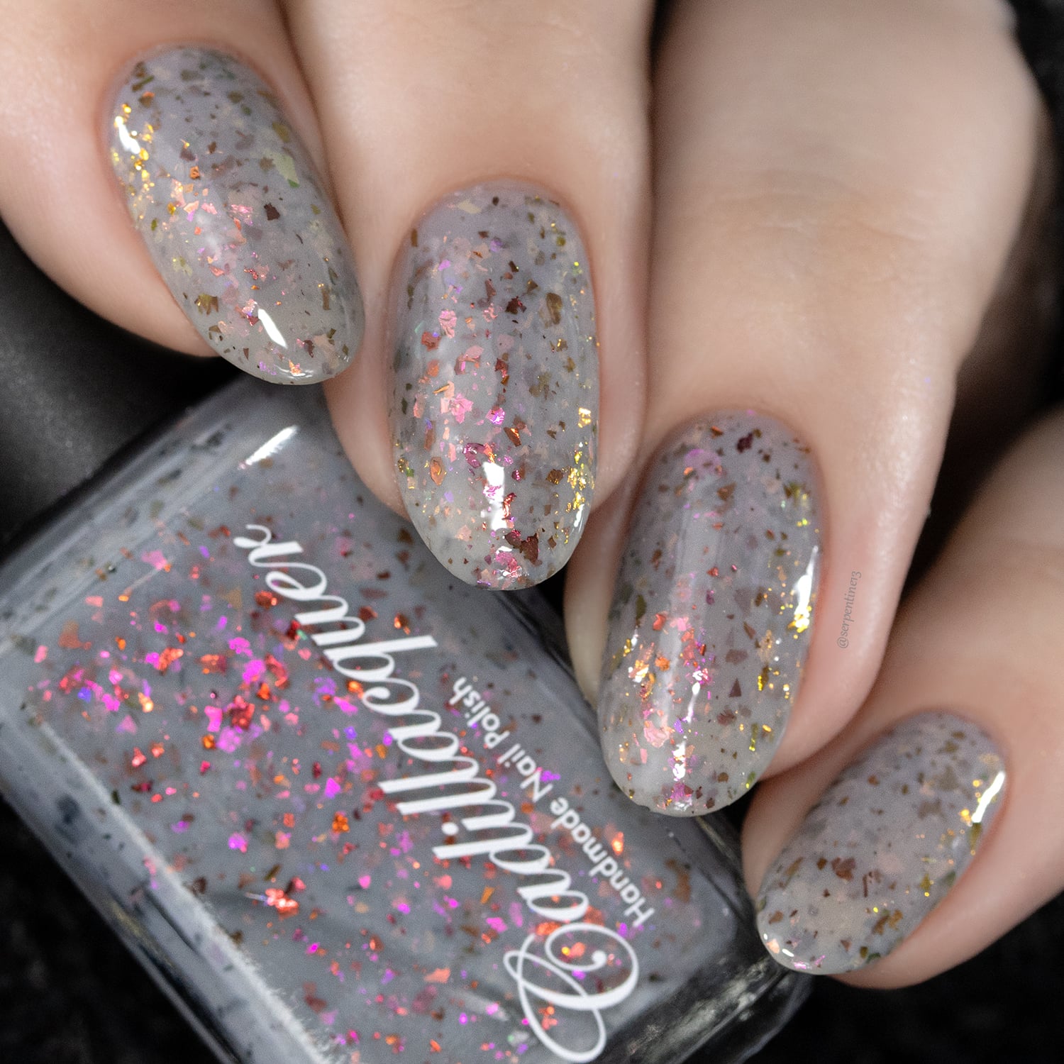 Cadillacquer Daydreaming grey red chameleon iridescent crelly nail polish, swatched on eight nails, light skin, studio lighting