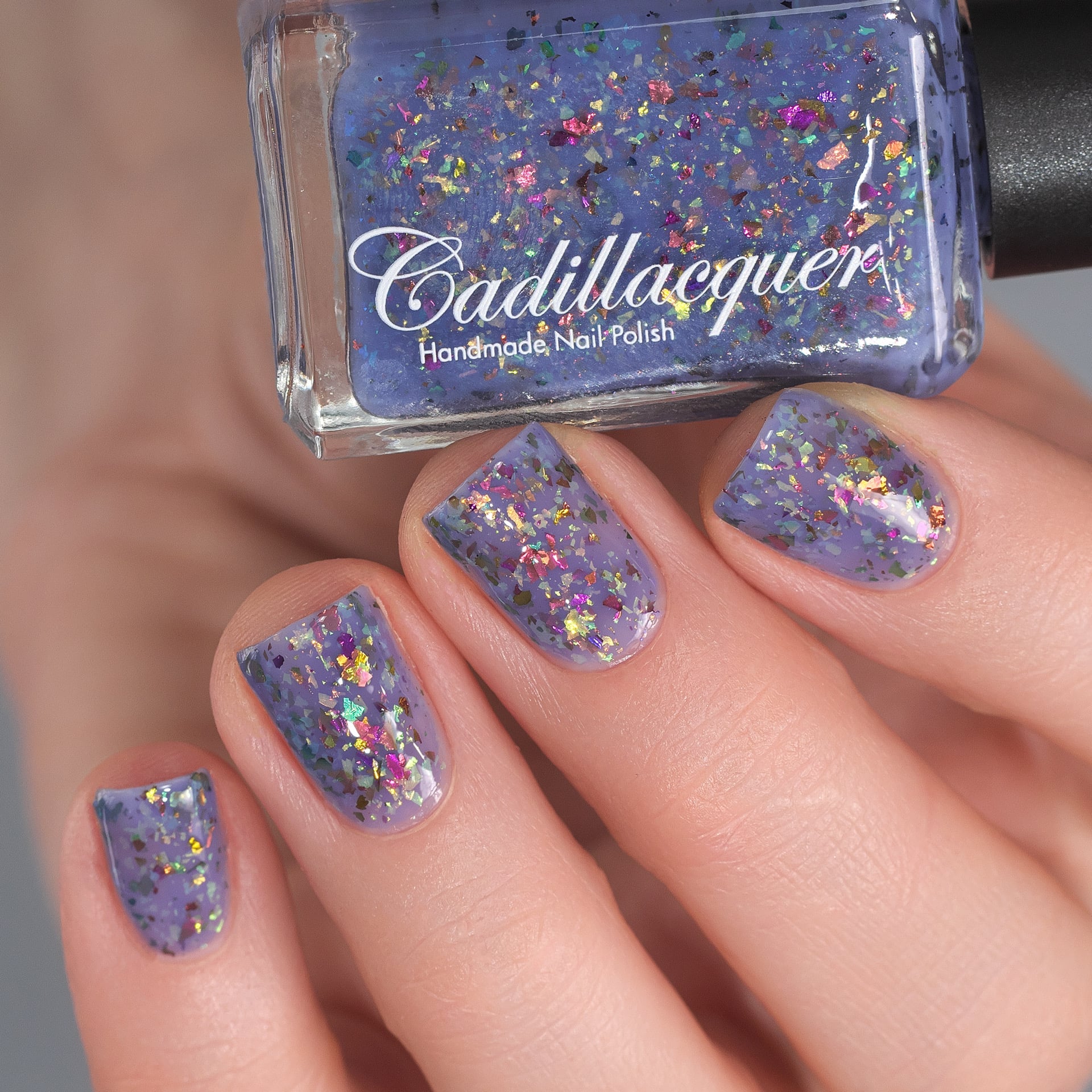 Cadillacquer Don't Worry purple pink chameleon iridescent crelly nail polish, swatched on eight nails, light skin, studio lighting