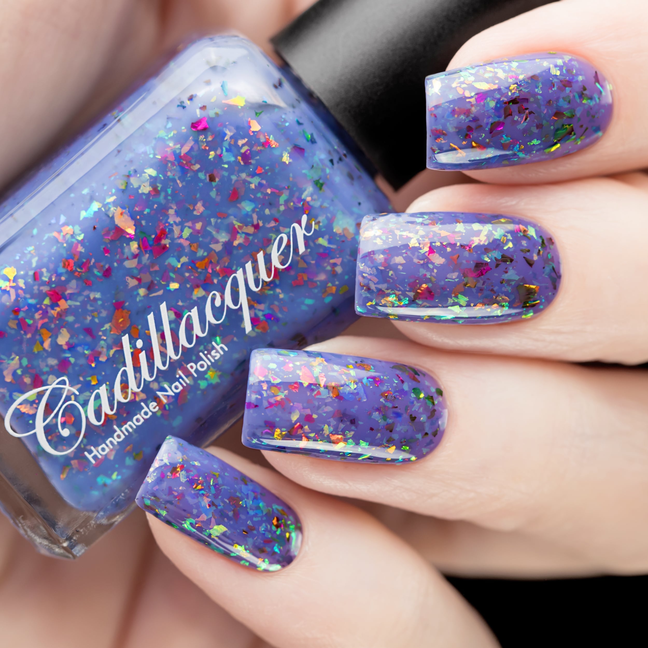 Cadillacquer Don't Worry purple pink chameleon iridescent crelly nail polish, swatched on eight nails, light skin, studio lighting