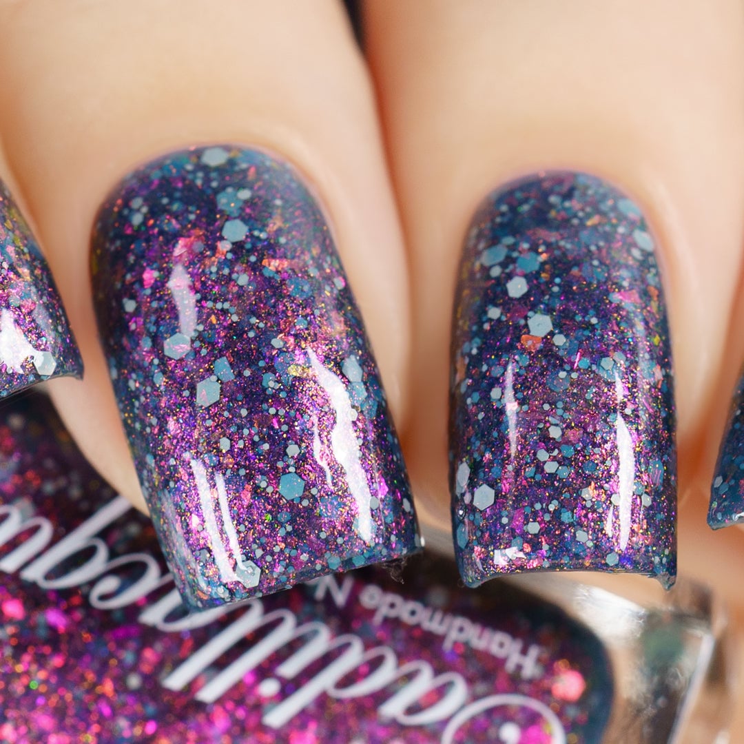 Cadillacquer I Don't Belong To You nail polish with sunset shimmer and flakies