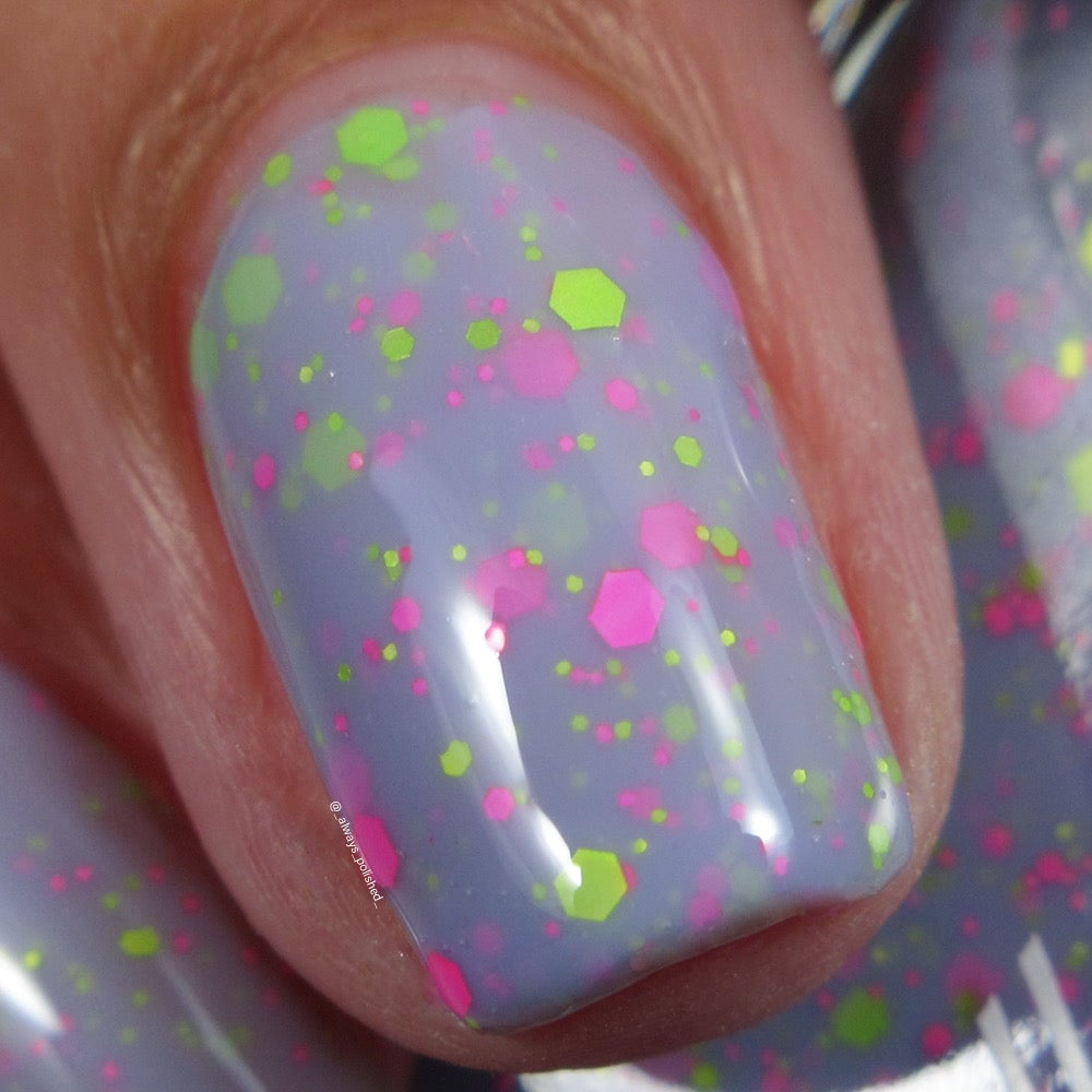 Close-up Cadillacquer Magical Creatures lilac nail polish with matte neon glitter