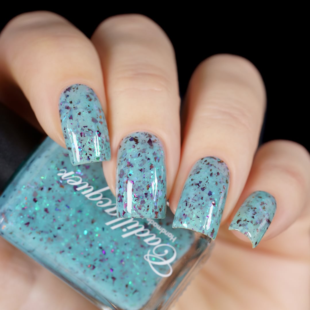 Cadillacquer Pastel Thoughts pastel teal purple chameleon iridescent crelly nail polish, swatched on four nails, light skin, studio lighting