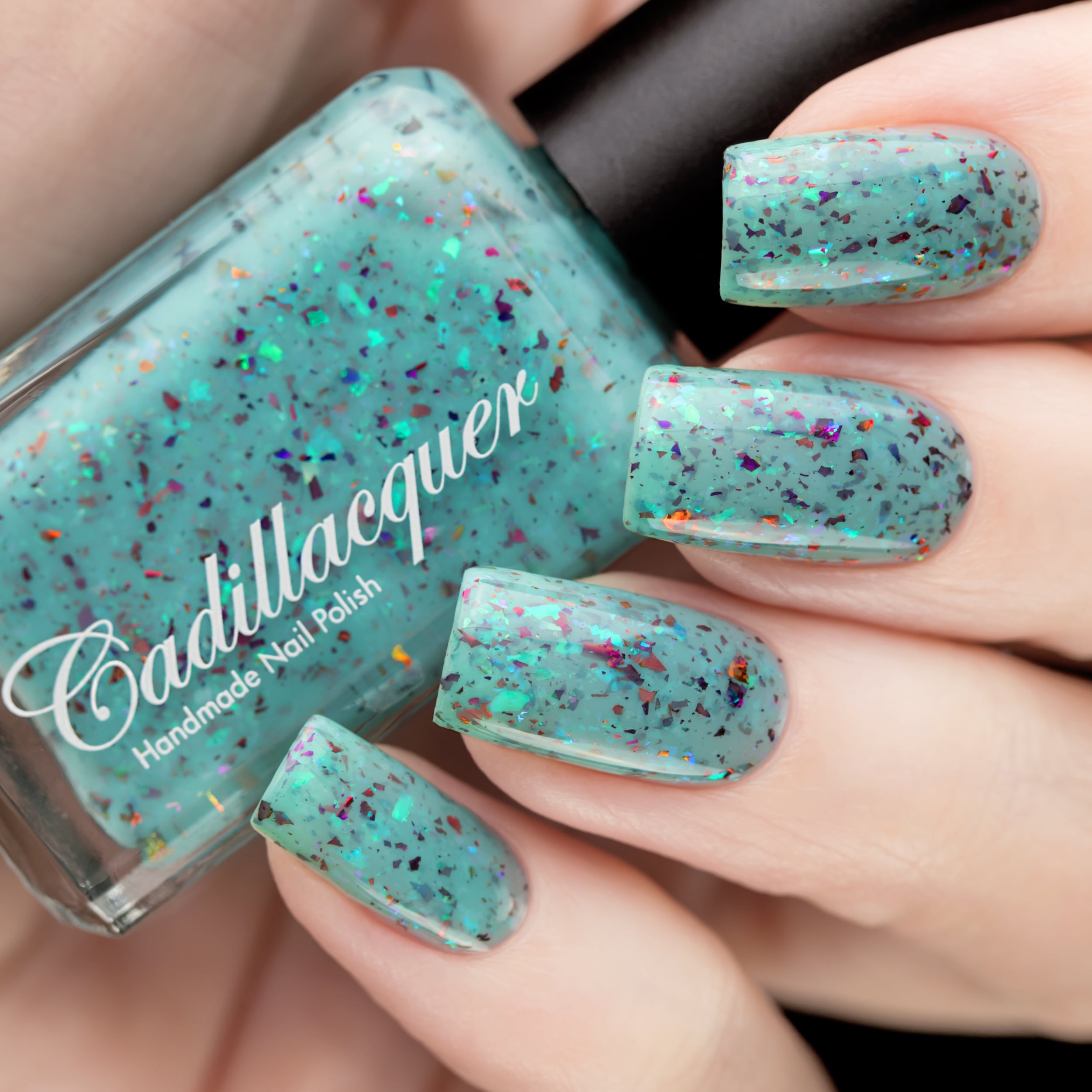 Cadillacquer Pastel Thoughts pastel teal purple chameleon iridescent crelly nail polish, swatched on eight nails, light skin, studio lighting