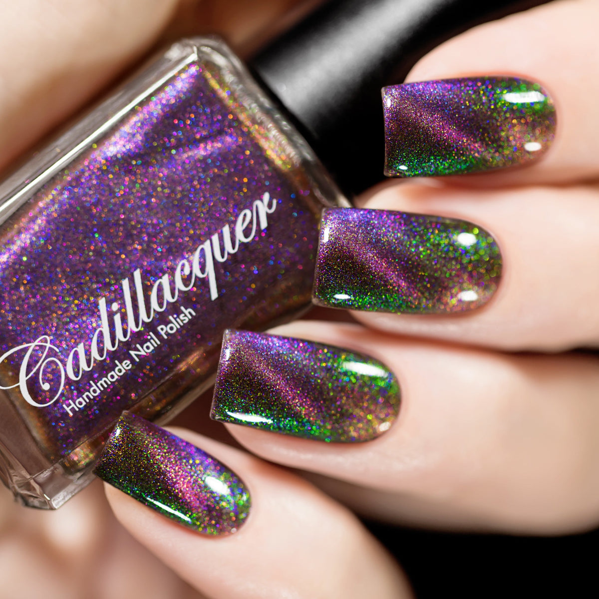 Magnetic shimmer Cadillacquer nail polish in Self Destruct, a dark base with subtle purple magnetic and yellow to green shimmer, swatched by @rafinails