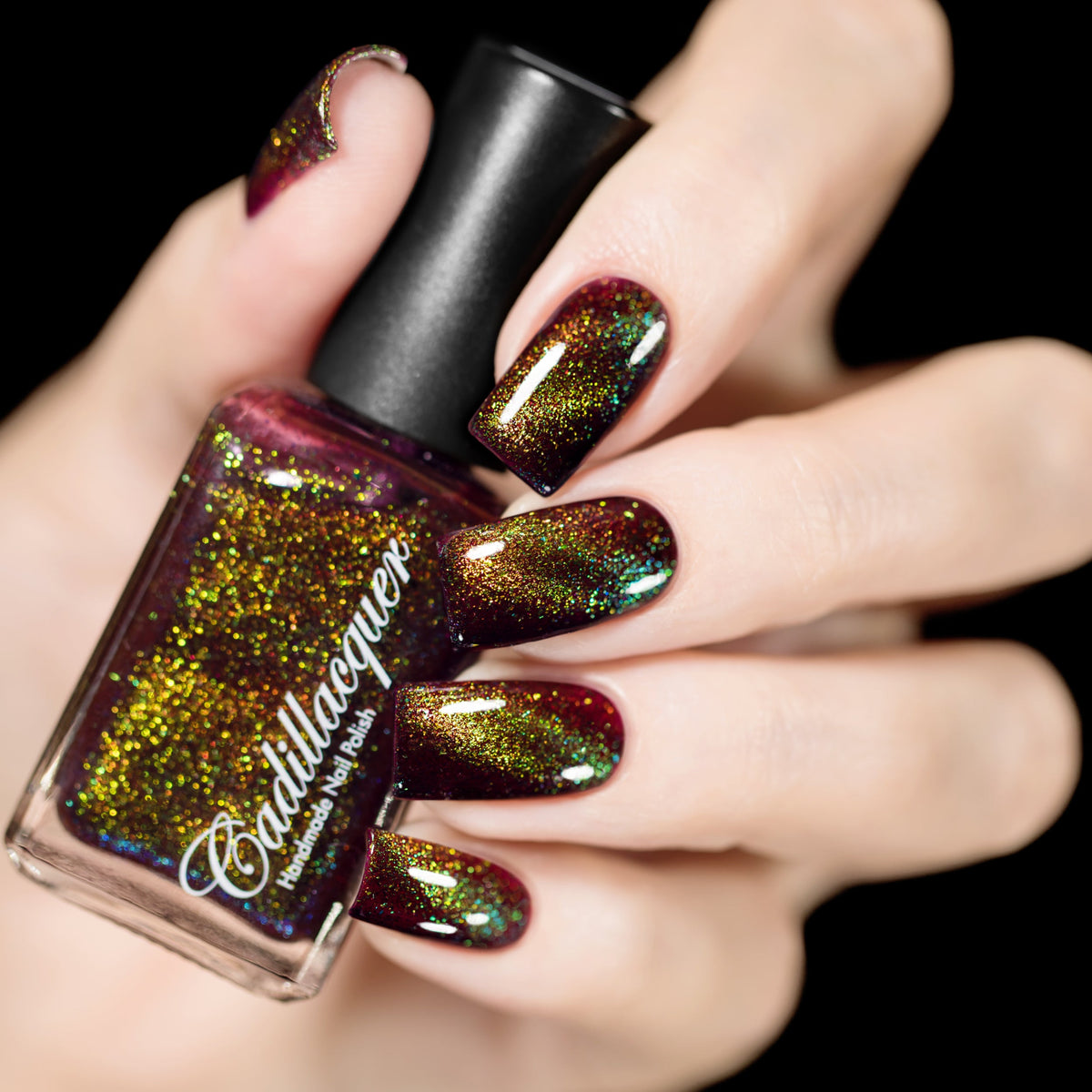 Cadillacquer Calypso nail polish swatch, green magnetic flakies over deep red jelly, swatched by @rafinails