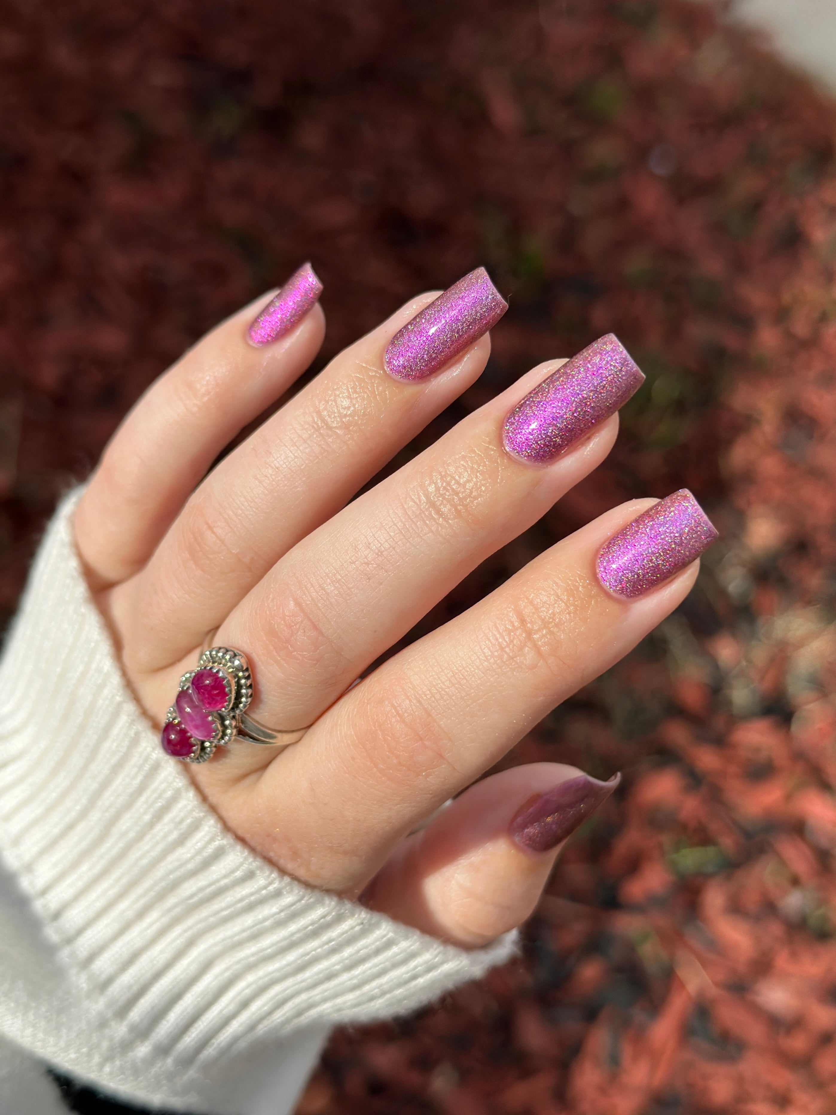 Keys to the Kingdom by Glitch Lacquer, berry multichrome holo swatch on light skin, squoval nails
