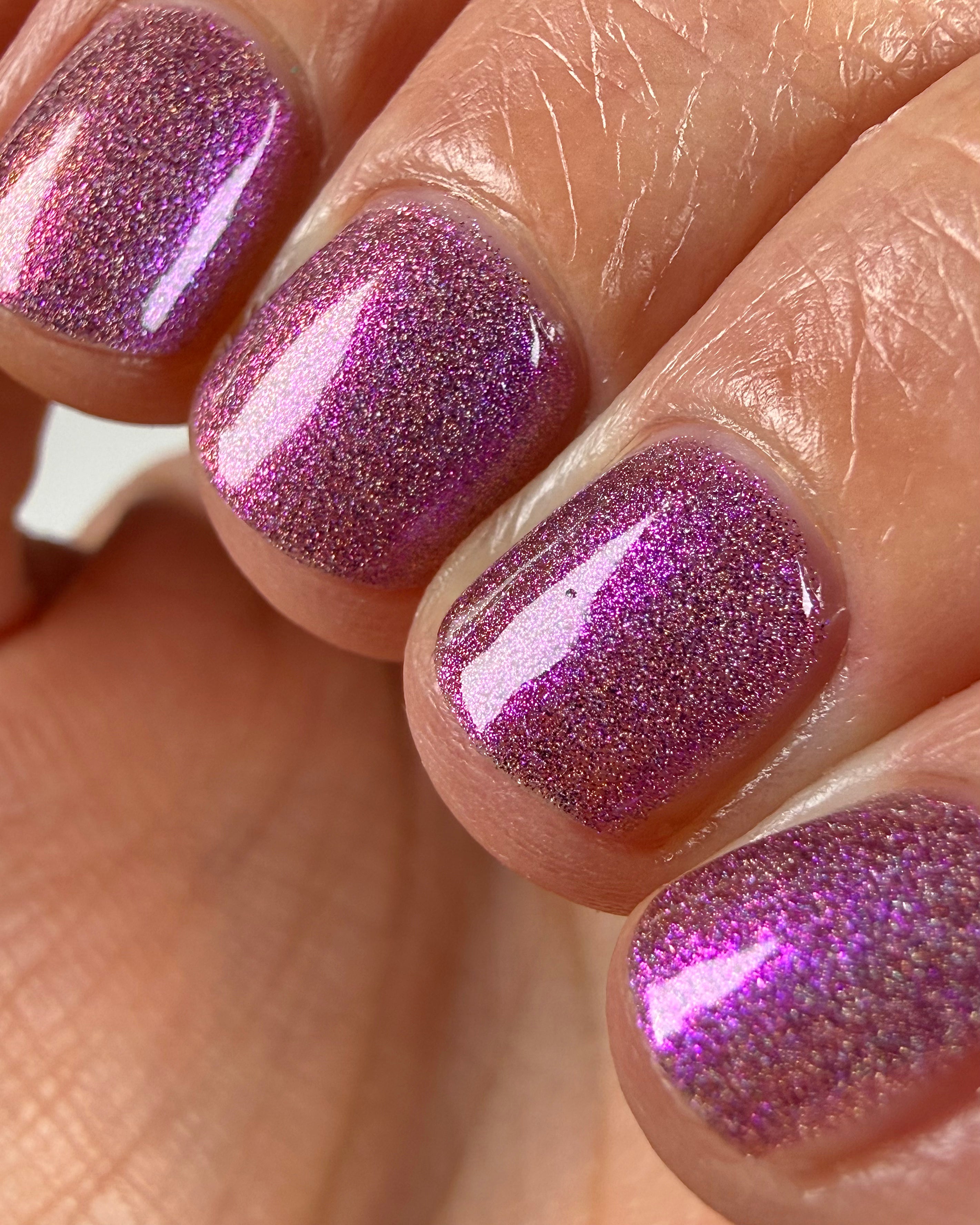 Keys to the Kingdom by Glitch Lacquer, berry multichrome holo swatch, light-medium, round nails