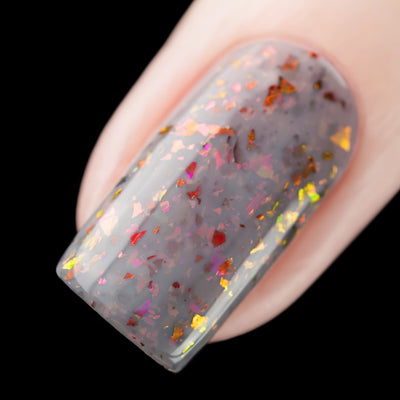 Cadillacquer Daydreaming grey red chameleon iridescent crelly nail polish, swatched on one nails, light skin, direct flash lighting