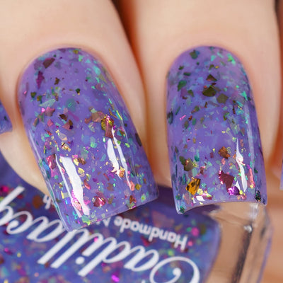 Cadillacquer Don't Worry purple pink chameleon iridescent crelly nail polish, swatched on three nails, light skin, studio lighting