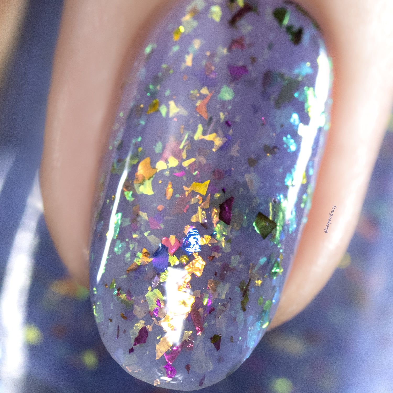 Cadillacquer Don't Worry purple pink chameleon iridescent crelly nail polish, macro single-nail swatch, light skin, bright daylight lighting