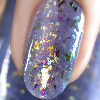 Cadillacquer Don't Worry purple pink chameleon iridescent crelly nail polish, macro single-nail swatch, light skin, bright daylight lighting