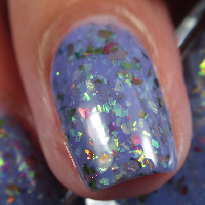 Cadillacquer Don't Worry purple pink chameleon iridescent crelly nail polish, macro single-nail swatch, light skin, bright daylight lighting