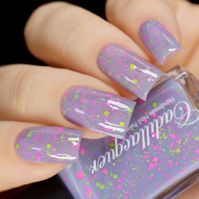 Magical Creatures by Cadillacquer swatched, pastel lilac crelly with neon glitter