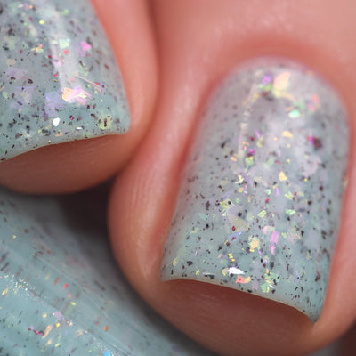 Cadillacquer Fresh Sheets pastel mint iridescent crelly nail polish, macro single-nail swatch, light skin, studio lighting, by @Lakodzen