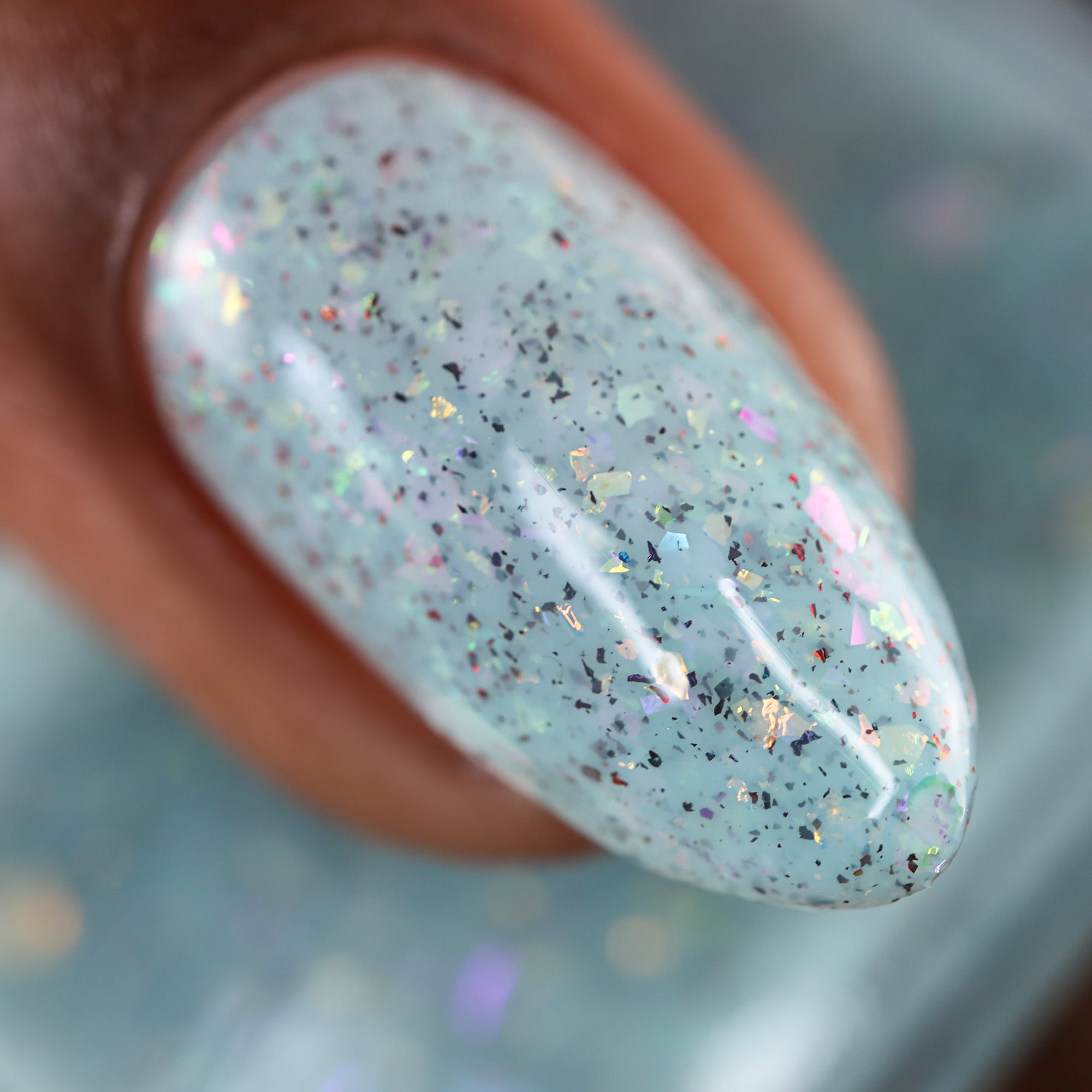 Cadillacquer Fresh Sheets pastel mint iridescent crelly nail polish, swatched on one nails, light-medium skin, studio lighting