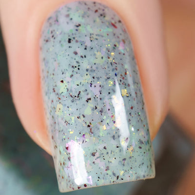 Cadillacquer Fresh Sheets pastel mint iridescent crelly nail polish, swatched on one nails, light skin, bright daylight lighting