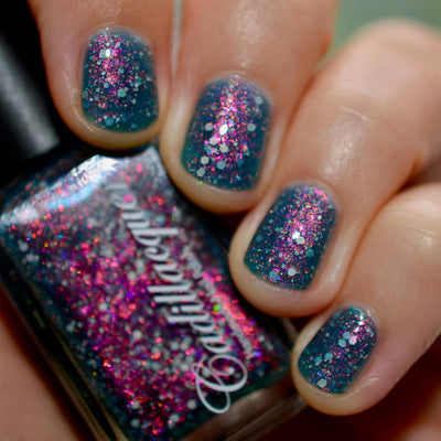Cadillacquer I Don't Belong To You dark blue jelly nail polish swatch with warm shimmer