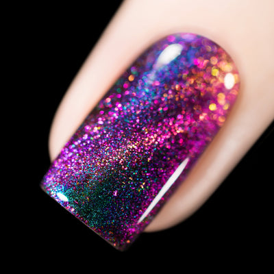 Close-up of Cadillacquer Like A Storm nail polish showing multichrome shift and magnetic flakies, swatched by @rafinails