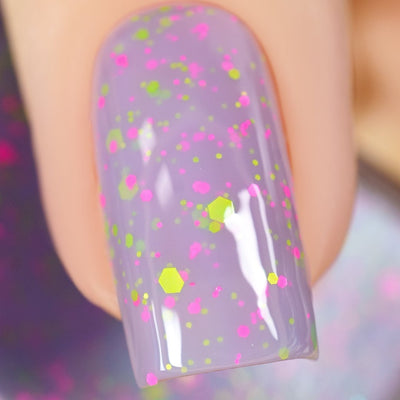 Cadillacquer Magical Creatures nail polish swatch, pastel lilac with neon glitter