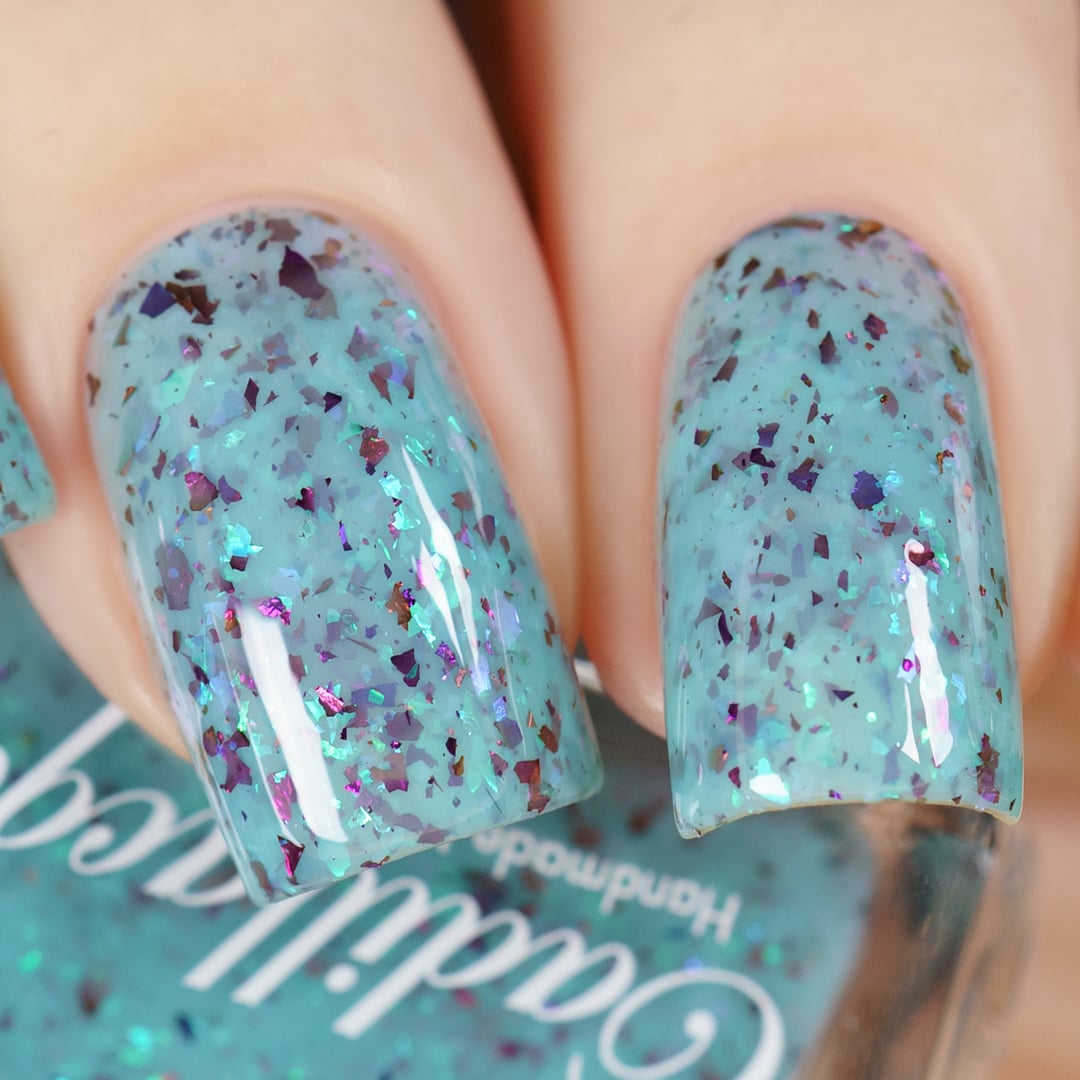 Cadillacquer Pastel Thoughts pastel teal purple chameleon iridescent crelly nail polish, swatched on three nails, light skin, studio lighting