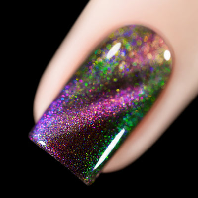 Close-up of Cadillacquer Self Destruct nail polish showing purple magnetic glow and yellow-green shimmer, swatched by @rafinails
