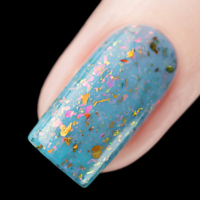 Cadillacquer Slow Mornings light blue gold chameleon iridescent crelly nail polish, swatched on one nails, light skin, studio lighting
