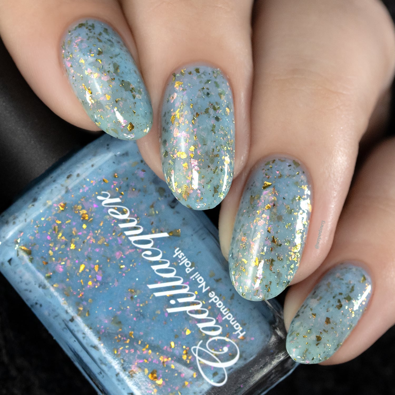 Cadillacquer Slow Mornings light blue gold chameleon iridescent crelly nail polish, swatched on four nails, light skin, studio lighting