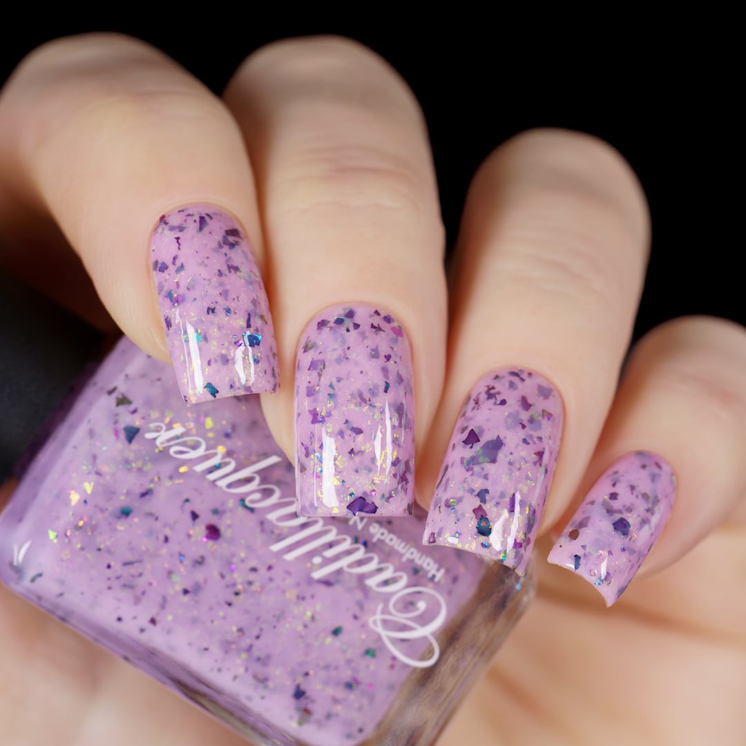 Cadillacquer Sweet Nothing pink teal chameleon iridescent crelly nail polish, swatched on four nails, light skin, studio lighting