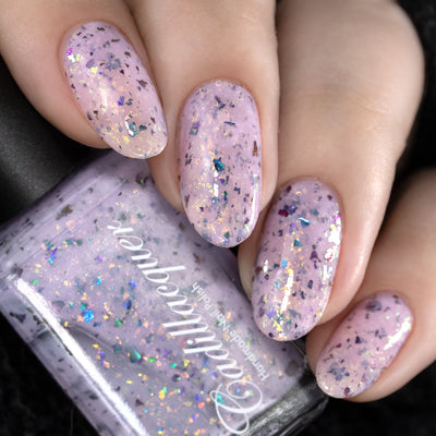 Cadillacquer Sweet Nothing pink teal chameleon iridescent crelly nail polish, swatched on four nails, light skin, studio lighting