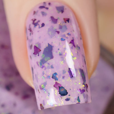 Cadillacquer Sweet Nothing pink teal chameleon iridescent crelly nail polish, macro single-nail swatch, light skin, studio lighting