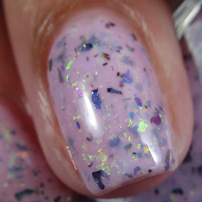 Cadillacquer Sweet Nothing pink teal chameleon iridescent crelly nail polish, macro single-nail swatch, light skin, bright daylight lighting