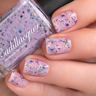 Cadillacquer Sweet Nothing pink teal chameleon iridescent crelly nail polish, swatched on eight nails, light skin, studio lighting