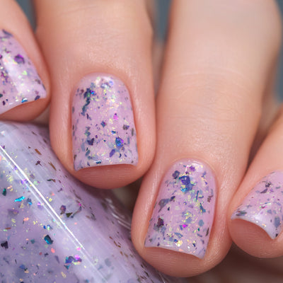Cadillacquer Sweet Nothing pink teal chameleon iridescent crelly nail polish, swatched on four nails, light skin, studio lighting