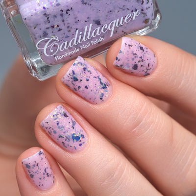 Cadillacquer Sweet Nothing pink teal chameleon iridescent crelly nail polish, swatched on four nails, light skin, studio lighting