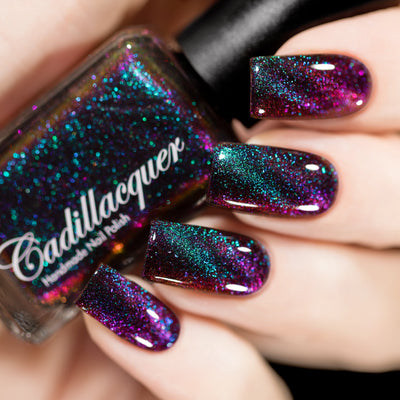 Magnetic flakie multichrome Cadillacquer nail polish in The Darkest Night, a black to red base with teal to purple magnetic flakies, swatched by @rafinails