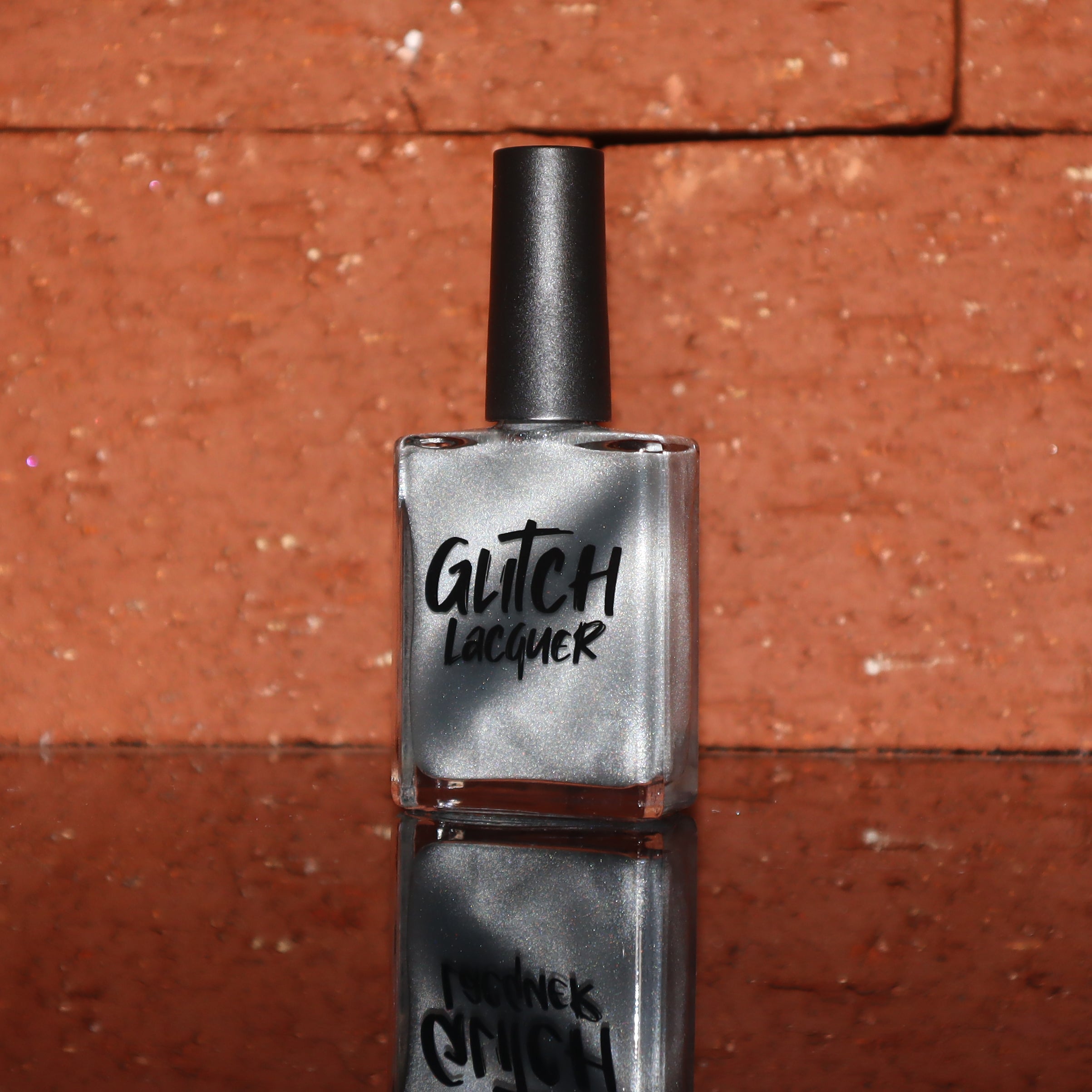 Ally by Glitch Lacquer, silver holographic magnetic topper, bottle